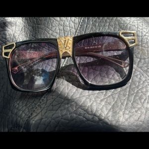 authentic Louis Vuitton sunglasses. You look like a million dollars!